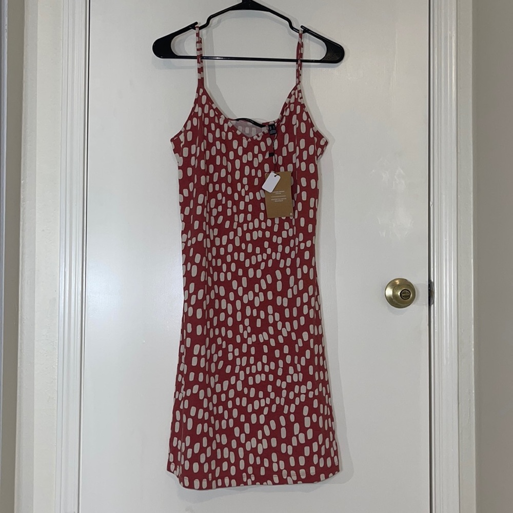 Unworn dress. With tags.